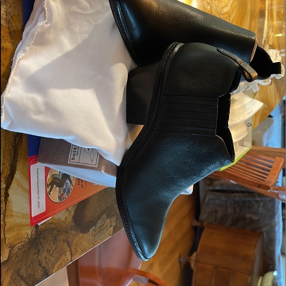 These are brand new shoes.  Black, western look